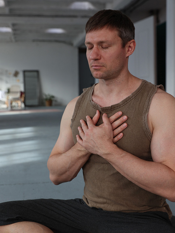 A man practices mindfulness and meditation.